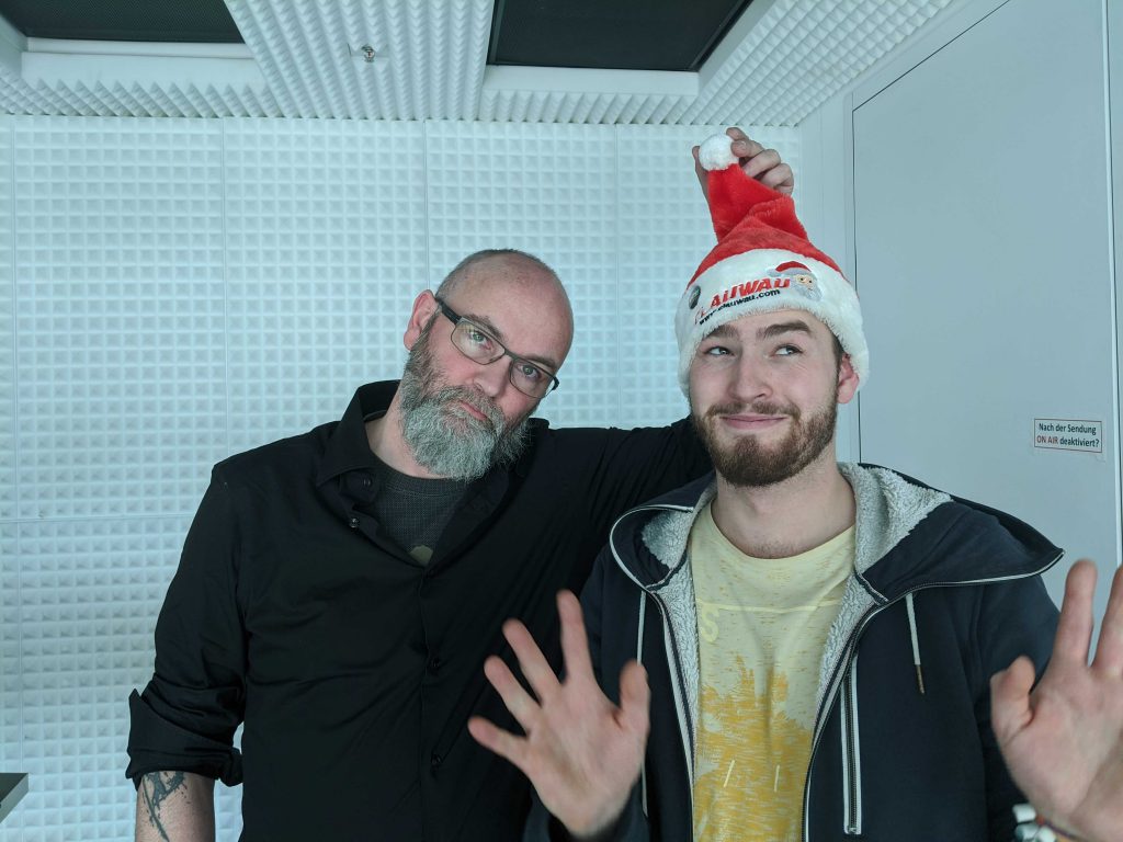 Chris und Matz mit Nikolausmütze