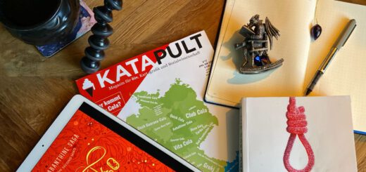 Bücher, ein Magazin und ein Notizbuch