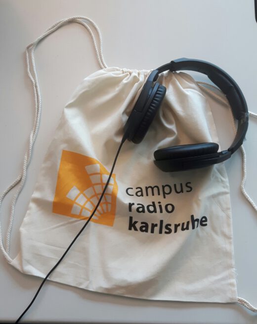 Campusradio-Beutel und Kopfhörer